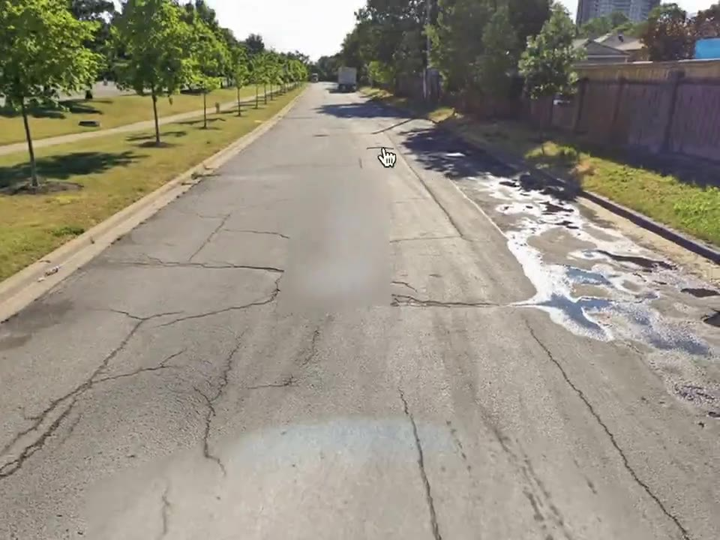 Mp4-Google Street View drive-through of the collector road showing surface cracking along the survey route