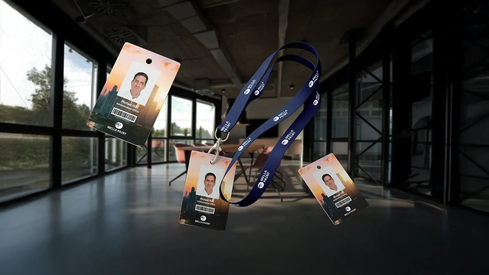 Three Mella Paint employee ID card holders on lanyards, hanging in a glass-walled office