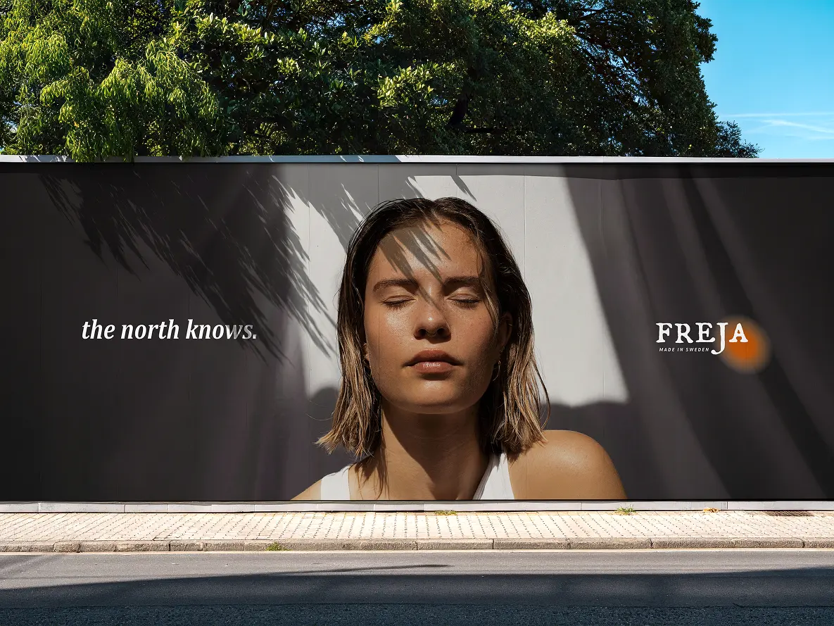 Construction hoarding ad for Freja reading the north knows.