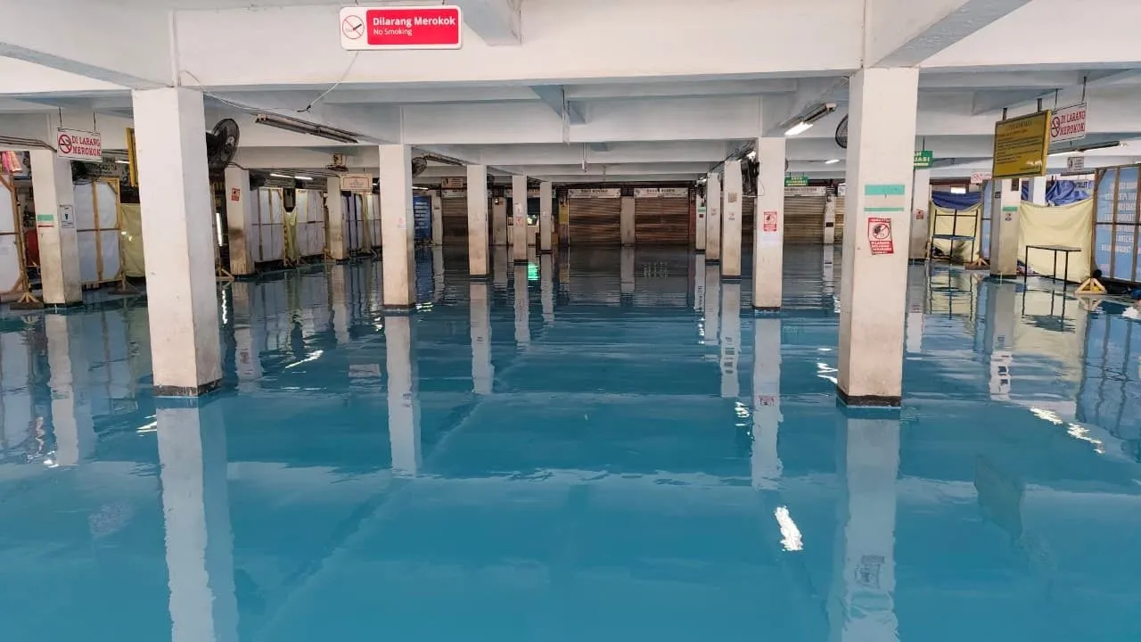 Blue epoxy floor at a Pelindo port facility